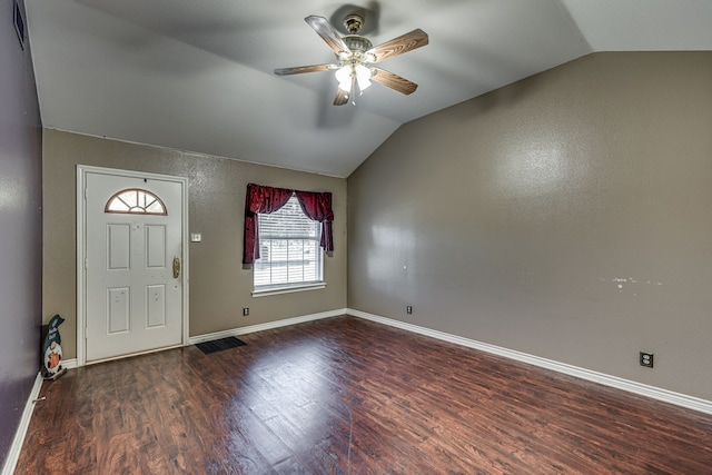 entrance foyer featuring ceiling fan, vaulted ceiling, and dark hardwood / wood-style flooring