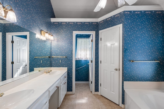 bathroom featuring a tub to relax in, vanity, crown molding, and ceiling fan