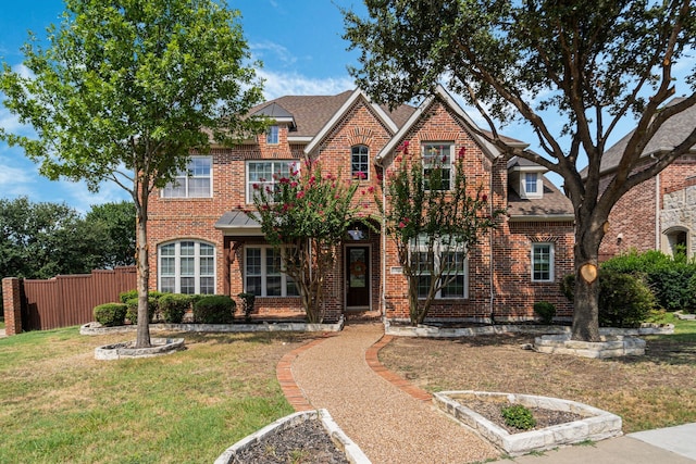 view of front of home featuring a front lawn