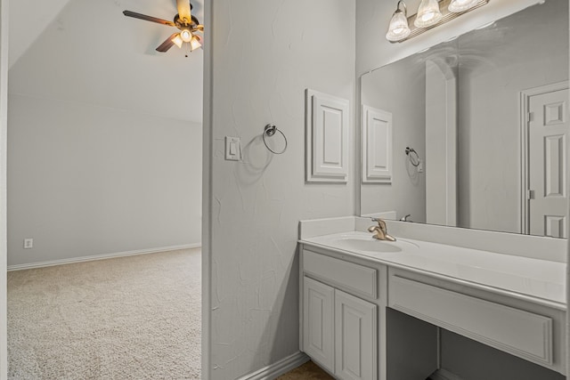 bathroom with ceiling fan and vanity