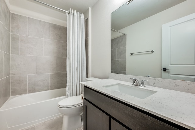 full bathroom with tile patterned flooring, shower / bath combo, toilet, and vanity