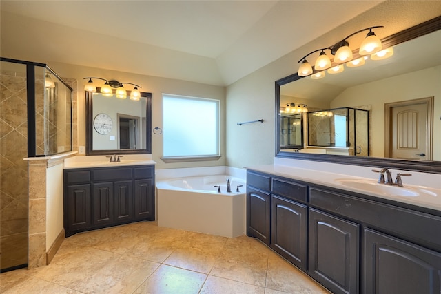 bathroom featuring plus walk in shower, vaulted ceiling, and vanity