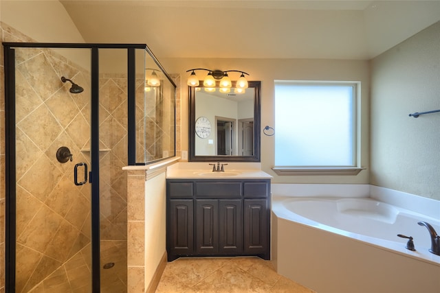 bathroom featuring tile patterned flooring, vanity, and shower with separate bathtub