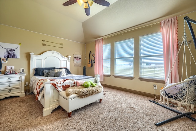 carpeted bedroom with ceiling fan and lofted ceiling