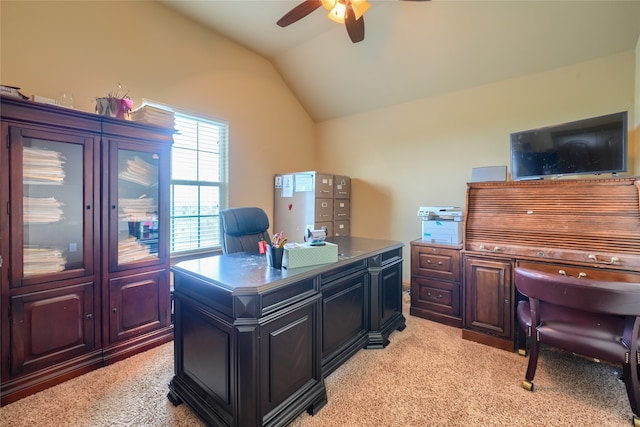 carpeted home office with ceiling fan and lofted ceiling