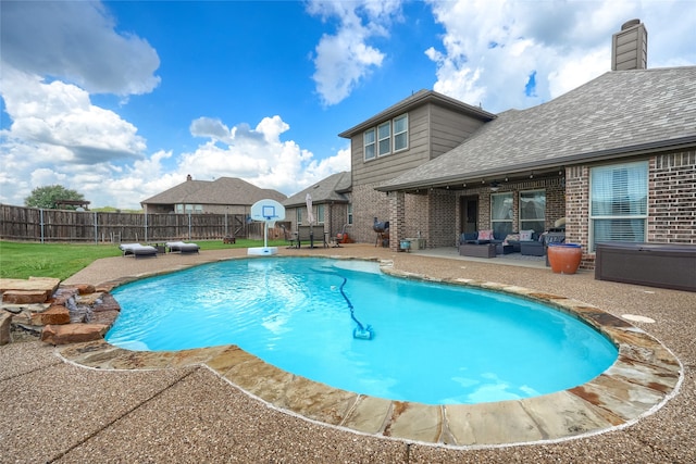 view of swimming pool with a patio area and outdoor lounge area