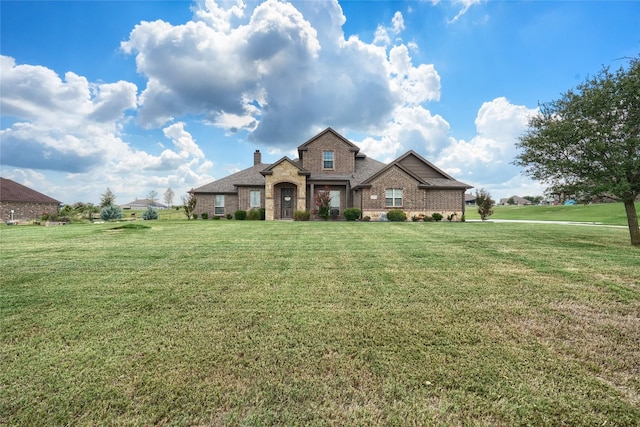 view of front of house with a front yard