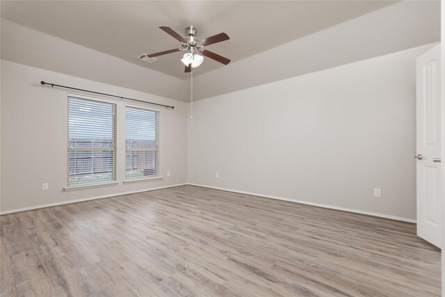 unfurnished room with ceiling fan and light hardwood / wood-style floors