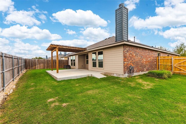 back of property featuring a pergola, a yard, and a patio