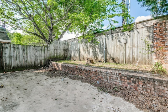 2823 Summit View Dr, Bedford, TX 76021 - view of yard featuring a fenced backyard and a patio