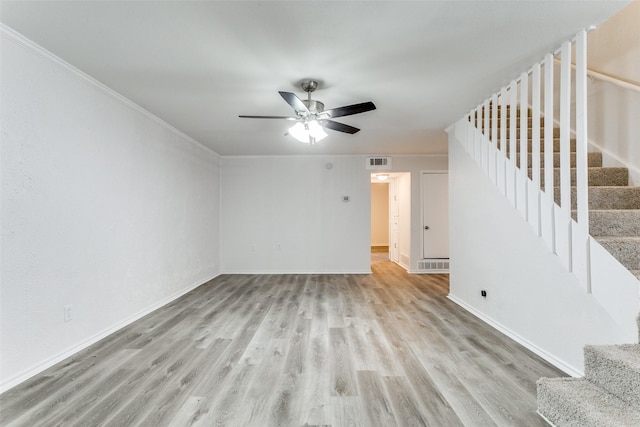2823 Summit View Dr, Bedford, TX 76021 - unfurnished living room with light wood-type flooring, visible vents, stairs, and ceiling fan