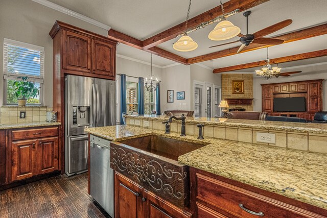 kitchen with backsplash, sink, crown molding, and custom range hood