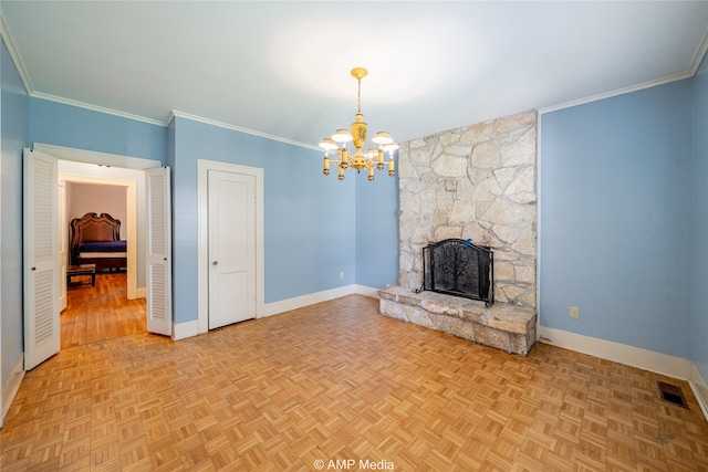 unfurnished living room with crown molding, light parquet floors, a notable chandelier, and a stone fireplace