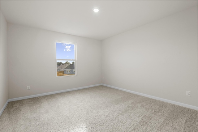 spare room featuring carpet flooring