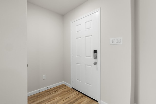 doorway to outside featuring light hardwood / wood-style flooring