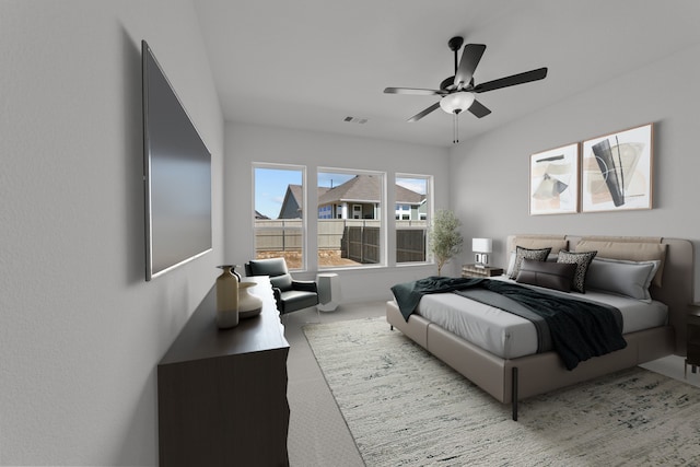 carpeted bedroom with ceiling fan