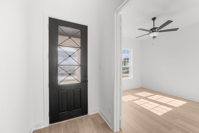 foyer featuring ceiling fan and light hardwood / wood-style floors