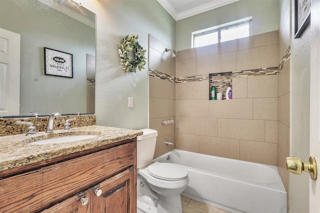 full bathroom with toilet, tile patterned flooring, ornamental molding, vanity, and tiled shower / bath