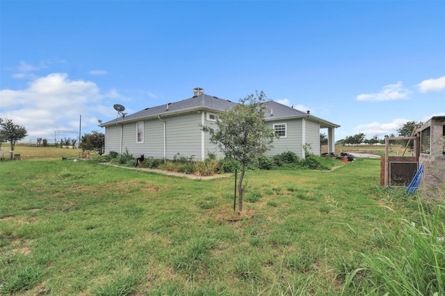 exterior space with a yard