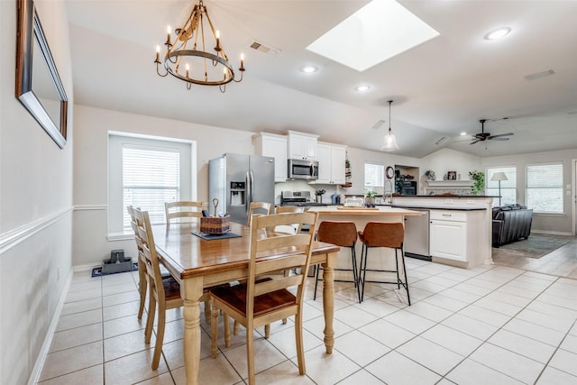 5204 Balsam Dr, Mckinney, TX 75071 - dining space with light tile patterned floors, plenty of natural light, and visible vents