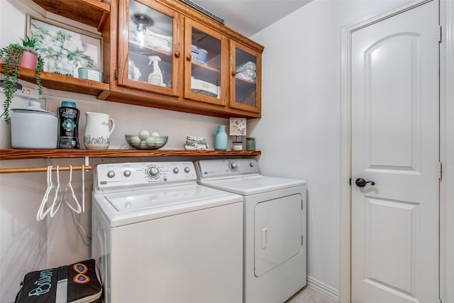 5204 Balsam Dr, Mckinney, TX 75071 - washroom featuring cabinet space and separate washer and dryer