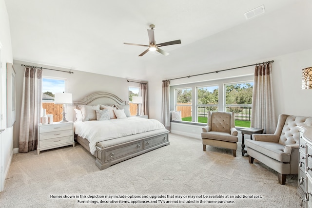 bedroom featuring light colored carpet and ceiling fan