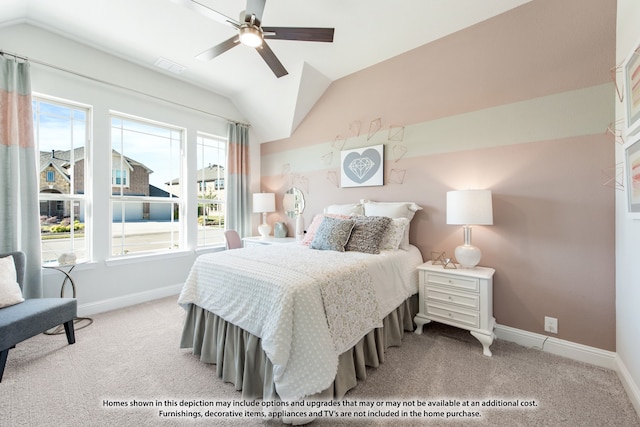 carpeted bedroom featuring lofted ceiling and ceiling fan