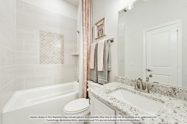 full bathroom featuring vanity, toilet, and tiled shower / bath