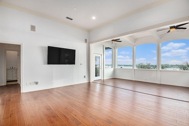 7006 Stone Bluff Ct, Granbury, TX 76048 - unfurnished living room with visible vents, ornamental molding, ceiling fan, and hardwood / wood-style flooring