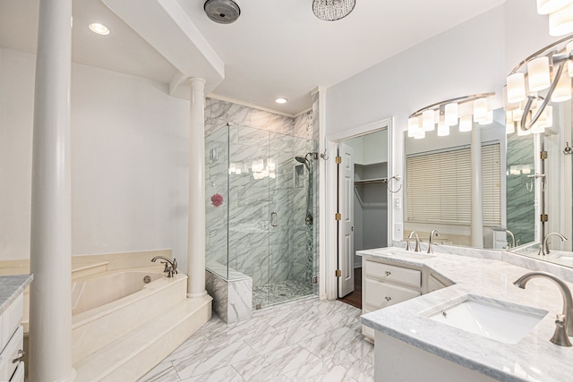 bathroom featuring vanity and shower with separate bathtub