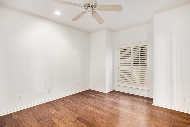 empty room with ceiling fan, hardwood / wood-style flooring, and ornamental molding