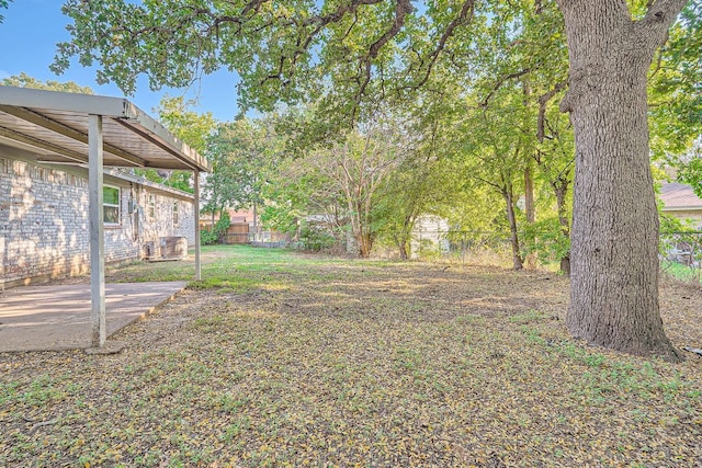 view of yard with a patio area and fence