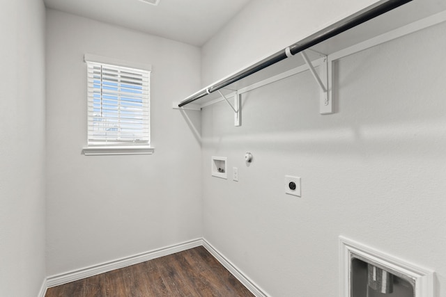 clothes washing area with electric dryer hookup, dark wood-type flooring, washer hookup, and hookup for a gas dryer