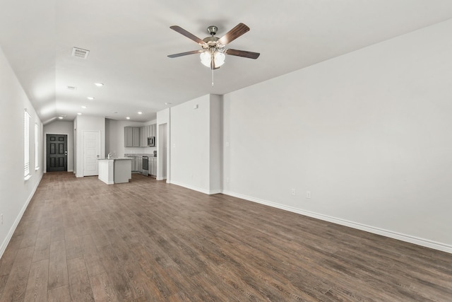 unfurnished living room with ceiling fan, dark hardwood / wood-style flooring, and lofted ceiling