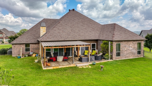 back of property featuring outdoor lounge area, a lawn, and a wooden deck