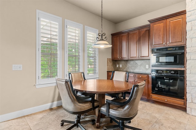 dining area with a wealth of natural light