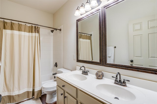 full bathroom with vanity, toilet, and shower / bath combo