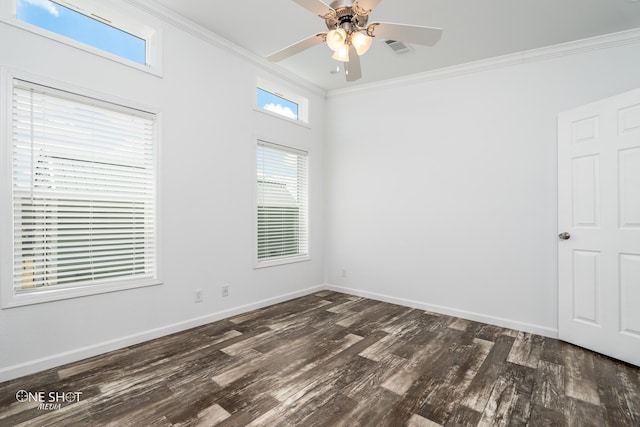 spare room featuring crown molding, ceiling fan, and dark wood-type flooring