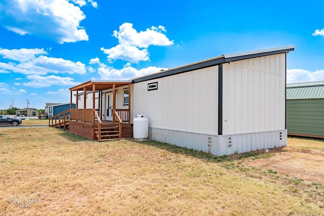 view of home's exterior with a yard