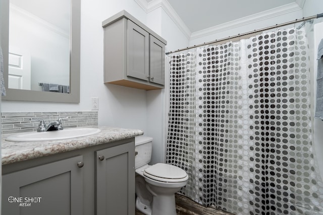 bathroom featuring curtained shower, crown molding, hardwood / wood-style floors, toilet, and vanity