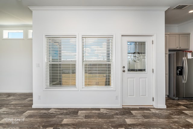 interior space with dark hardwood / wood-style floors and crown molding