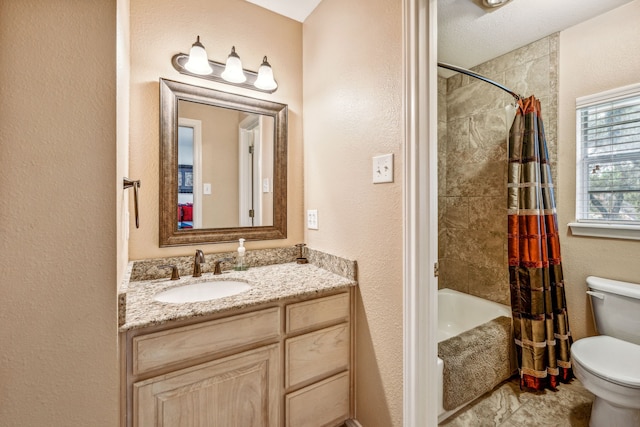 full bathroom featuring a textured ceiling, vanity, toilet, and shower / bath combo