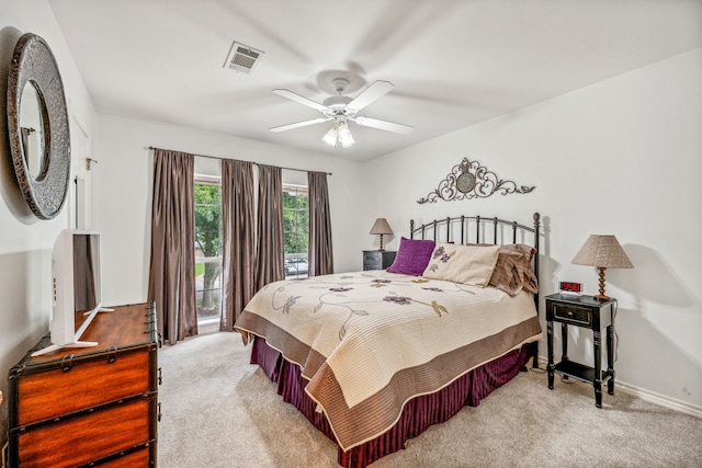 bedroom with light colored carpet and ceiling fan