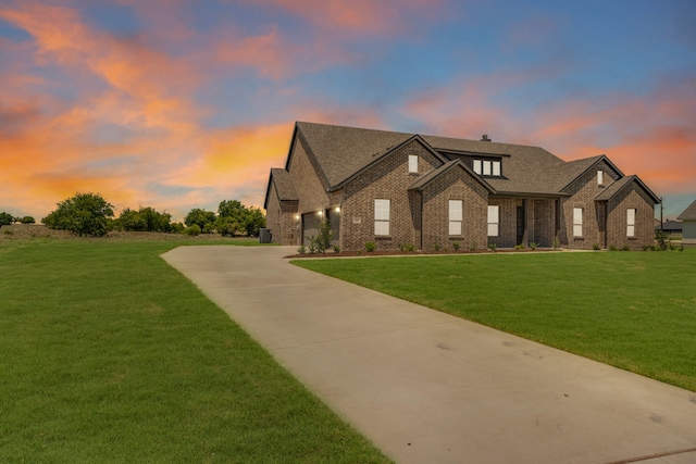 view of front of house with a lawn