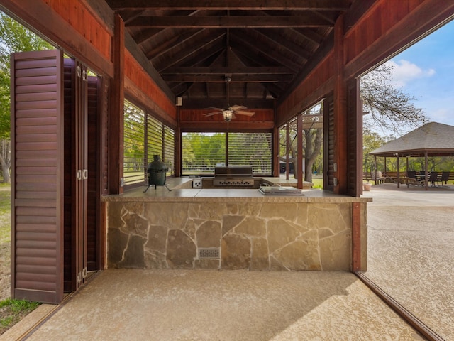 view of patio / terrace featuring a grill, ceiling fan, area for grilling, and a gazebo