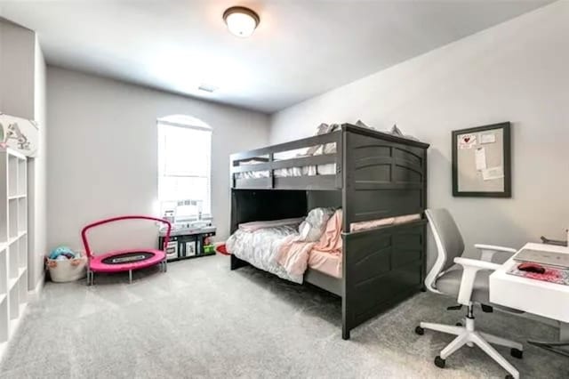 bedroom featuring carpet