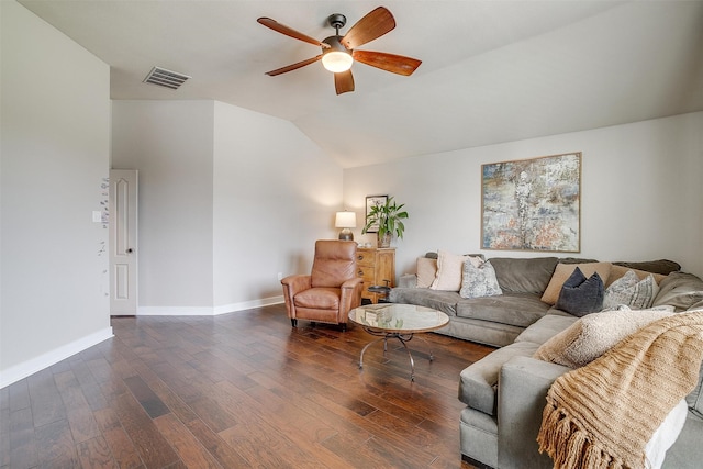 living room featuring lofted ceiling, dark wood-type flooring, and ceiling fan