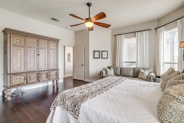 bedroom with dark wood-type flooring and ceiling fan