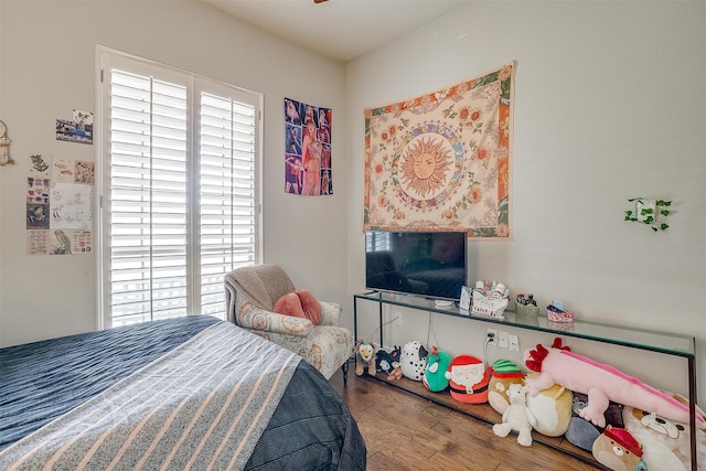 bedroom featuring hardwood / wood-style floors