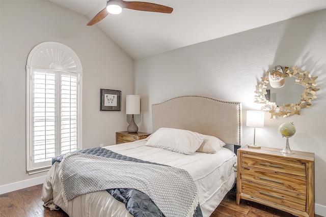 bedroom featuring lofted ceiling with beams, dark wood-type flooring, and ceiling fan